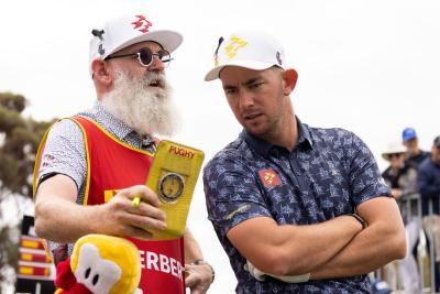 Lucas Herbert with his caddie Nick Pugh